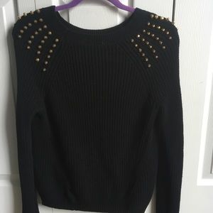Black sweater with gold studs